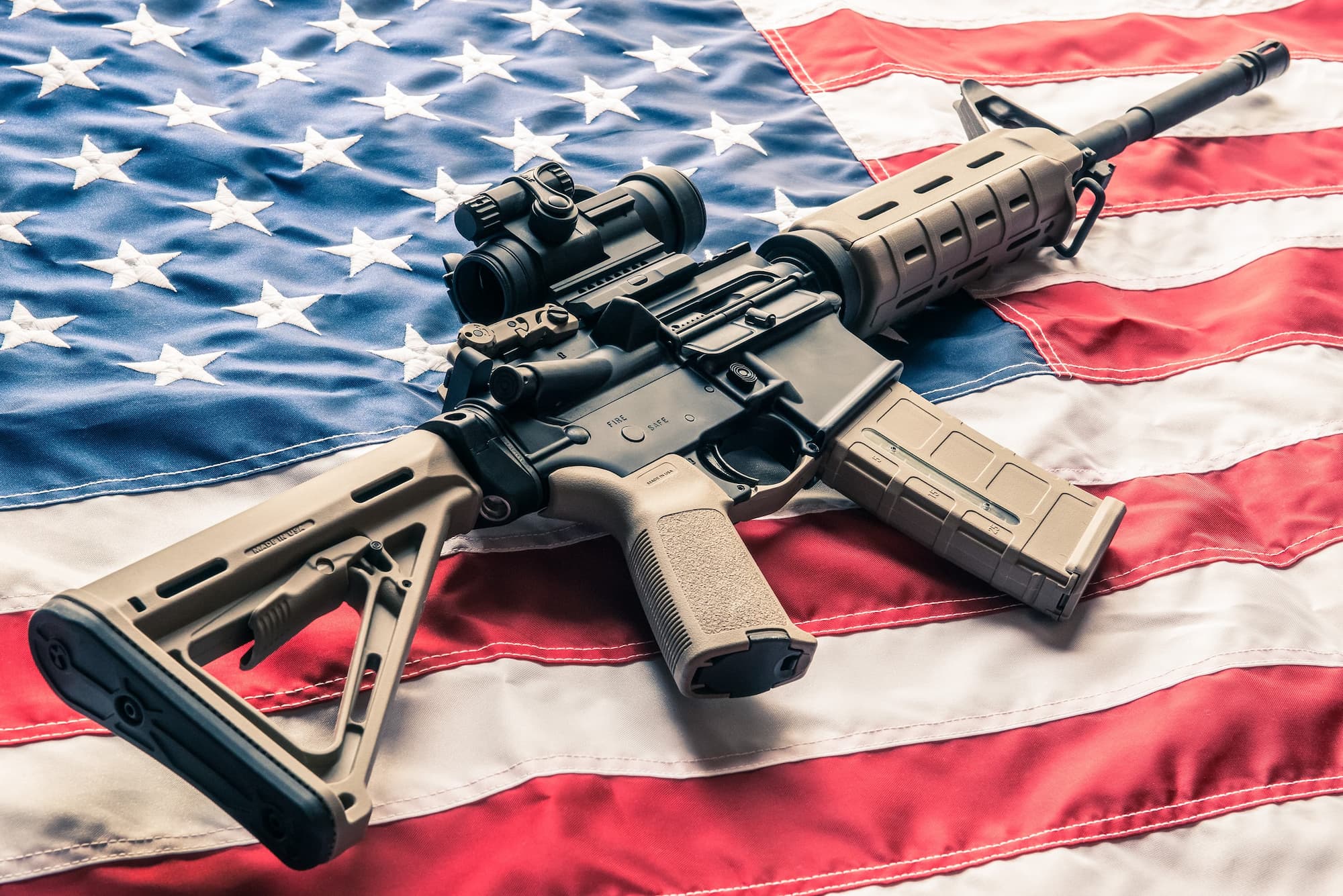 Gun laying on US flag